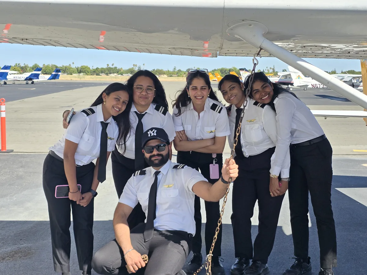 A group of AIAA cadets on the apron